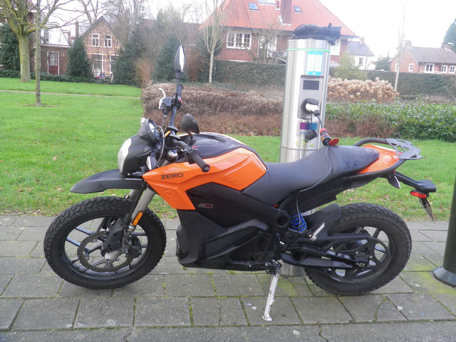 Zero Motorcycle being charged using an adapter Type 2 to C13